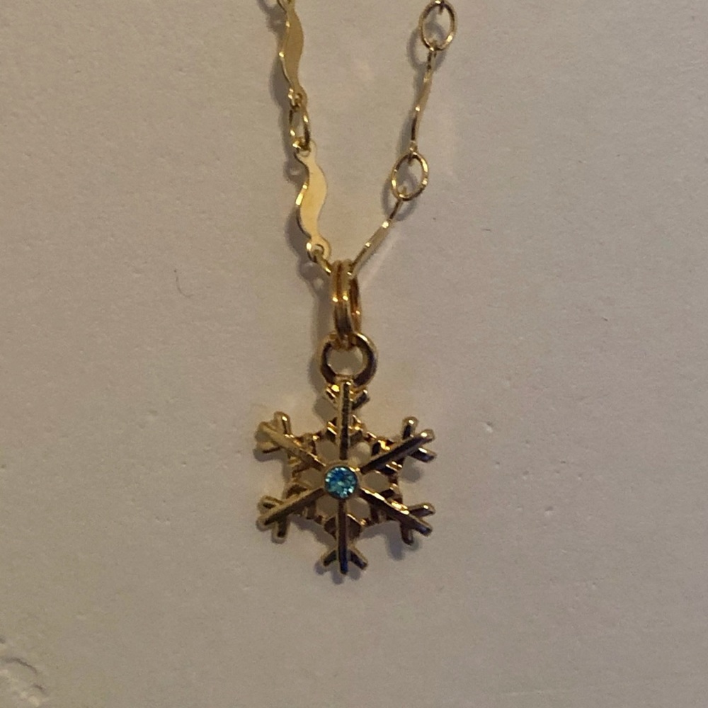 Gold Snowflake pendant with Aquamarine center gem